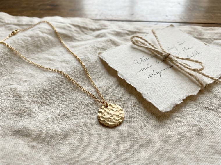 A Prescott pendant with its handwritten tag